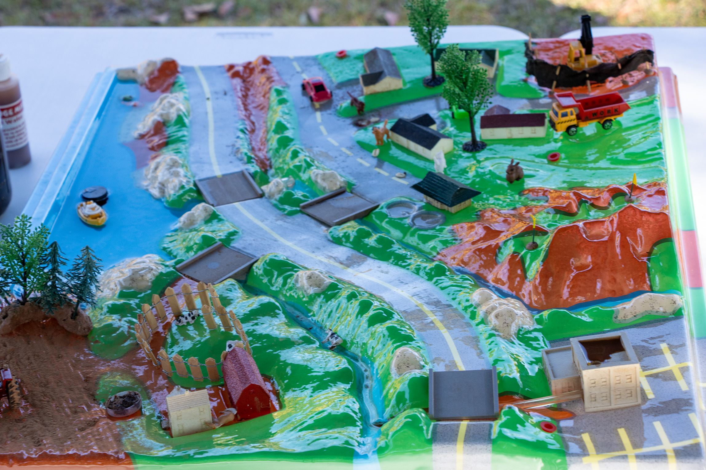 A plastic, multicolored, tabletop-sized model used to demonstrate various stormwater processes encountered in Beaufort County