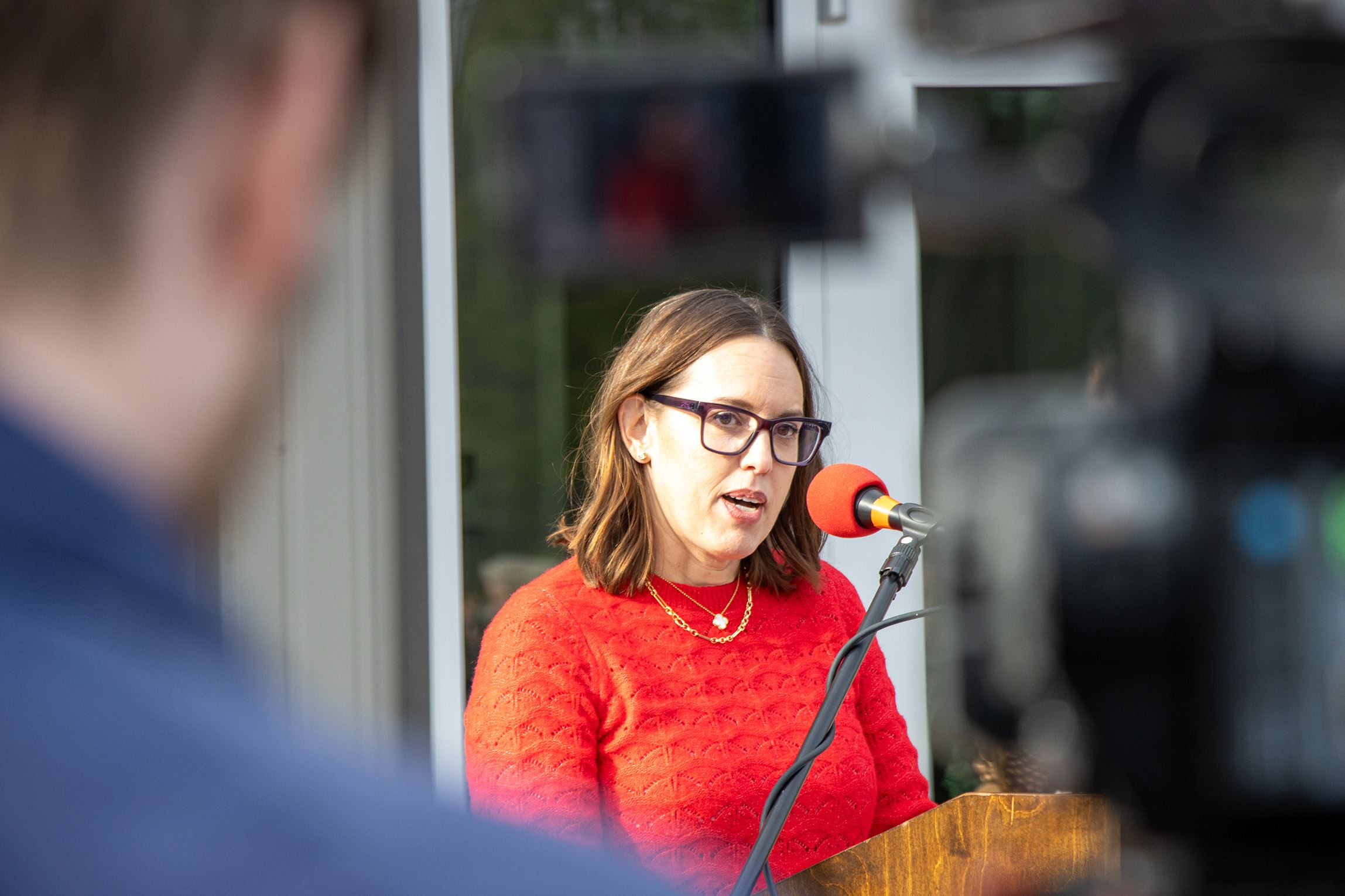 Pharmacy Director Kennedy Blounts speaks at the podium