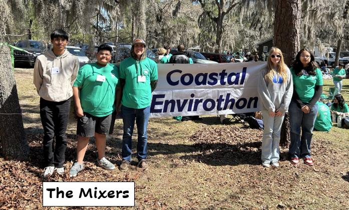 Five students standing in front of a Coastal Envirothon banner